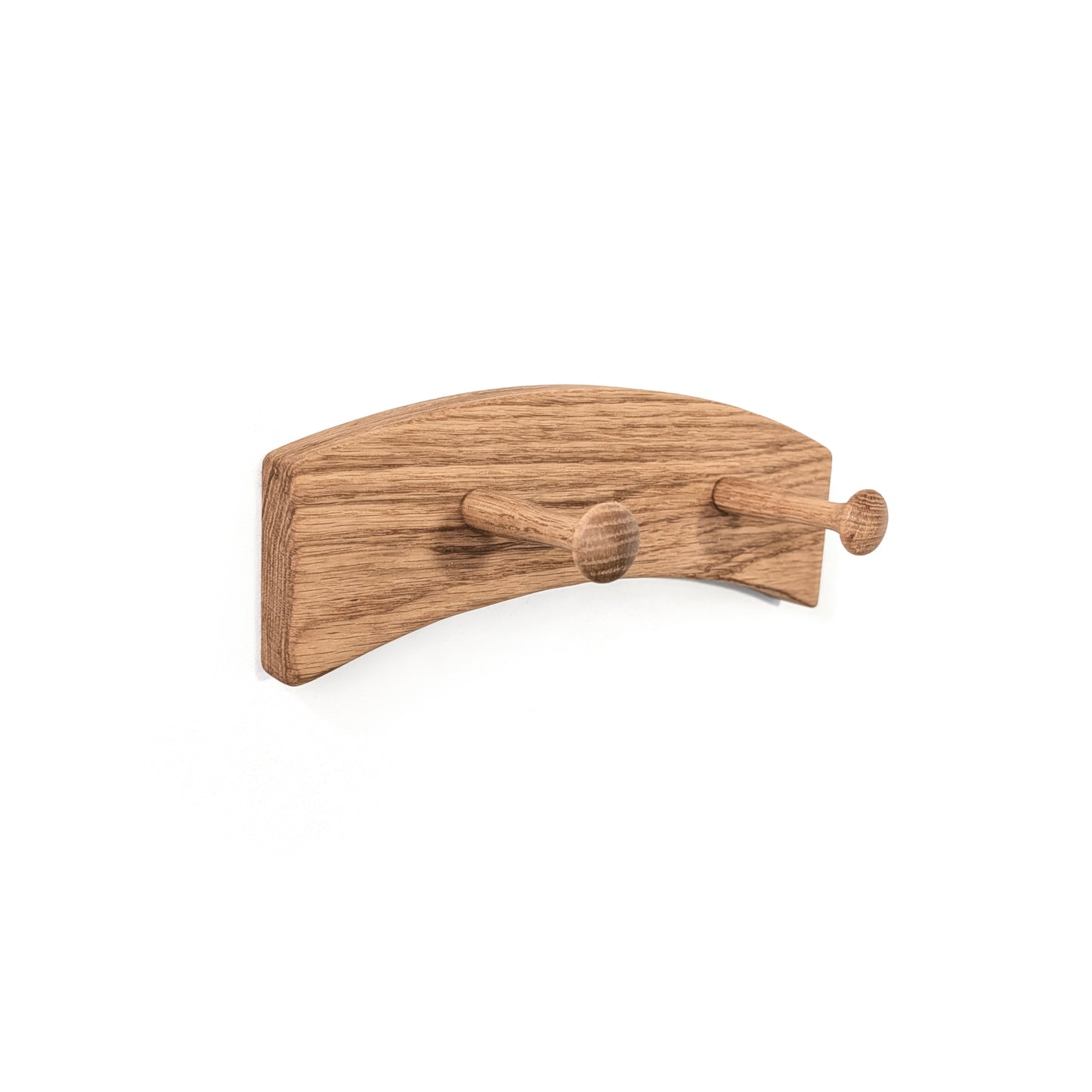 Arched oak coat rack with two shaker pegs