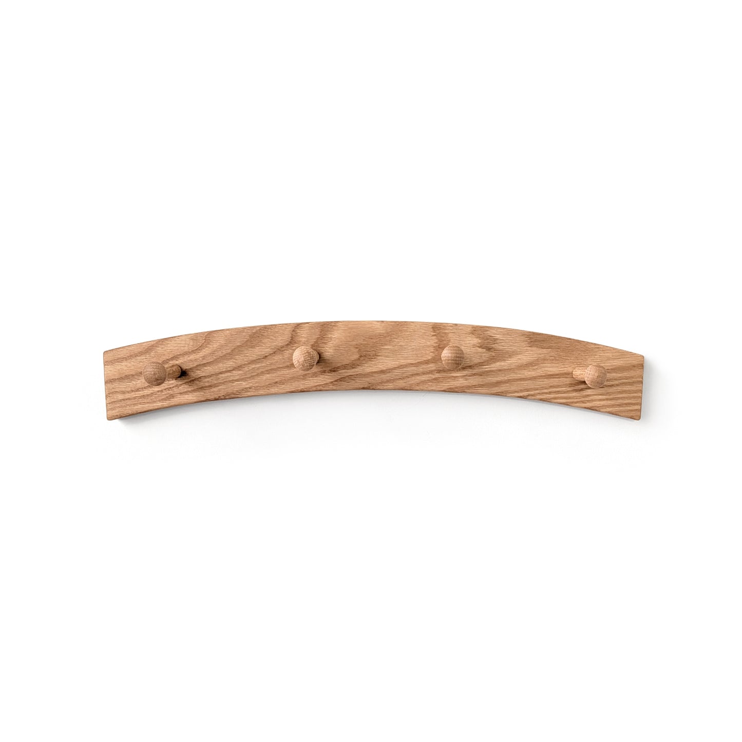 Arched wooden wall coat rack with four hooks on a white background