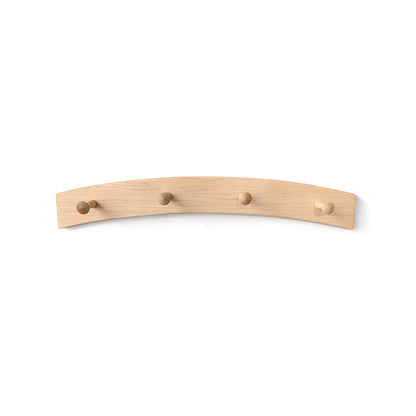 Wood arched coat rack with four hooks on a white background