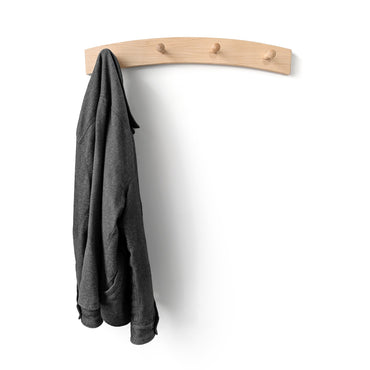Arch wood coat rack with a gray jacket and 4 shaker pegs on a white background
