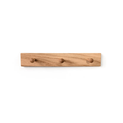 Wooden coat rack with three hooks on a white background