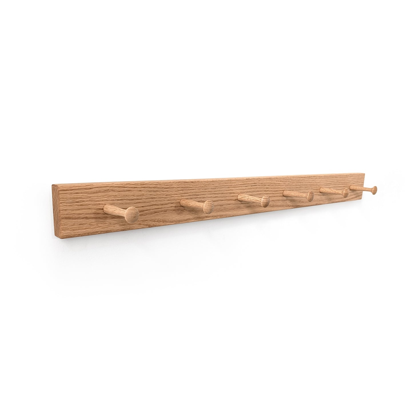 Oak wood coat rack with six hooks on a white background