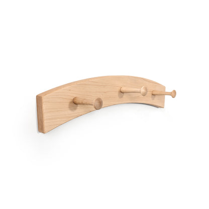 Wooden wall hook coat rack with three pegs on a white background
