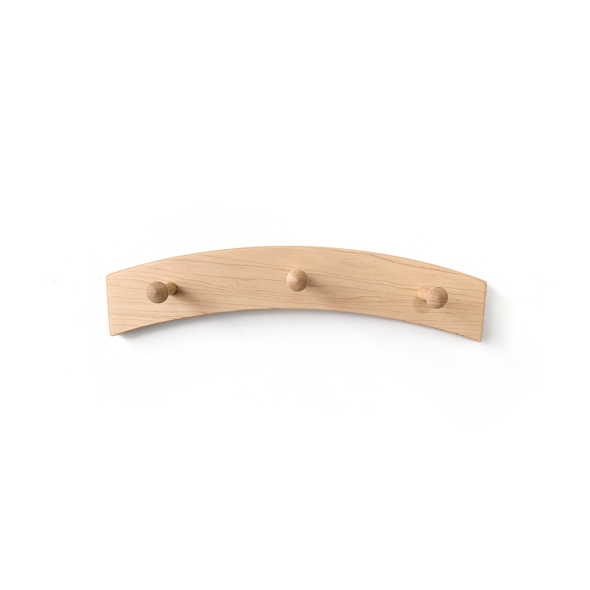 Wooden coat rack with three hooks on a white background