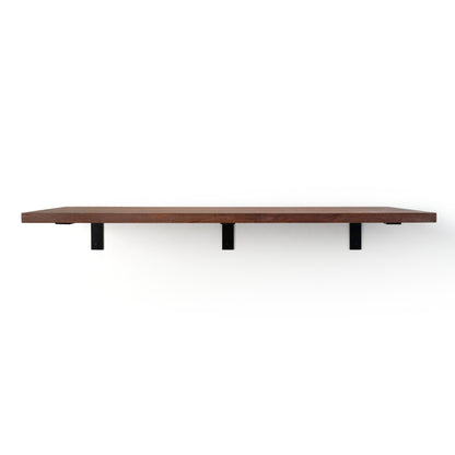 Mahogany shelf with steel black brackets on a white background