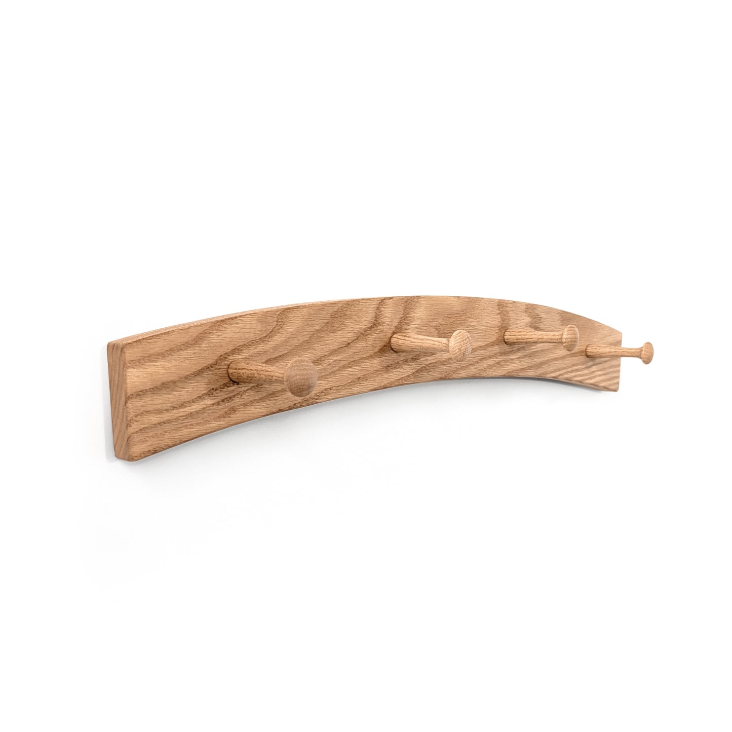 Wooden wall hook coat rack with four hooks on a white background