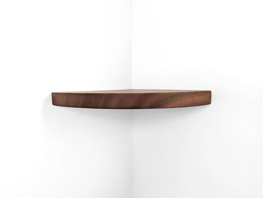 Front view of a thick floating shelf for corners in mahogany