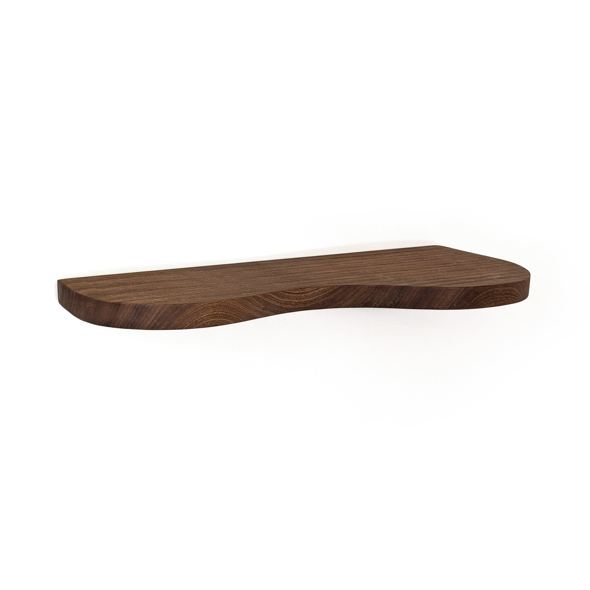 A dark brown wooden walnut floating shelf with a wavy, organic silhouette and visible wood grain, shown against a plain white background.