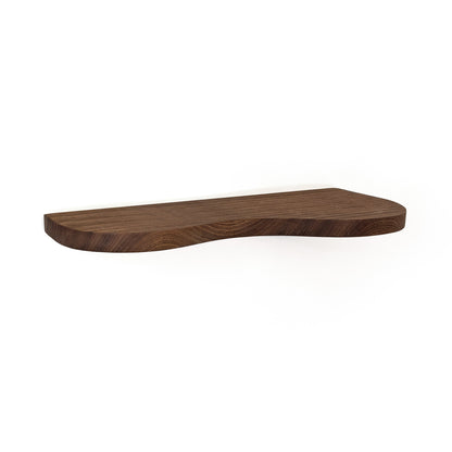A dark brown wooden walnut floating shelf with a wavy, organic silhouette and visible wood grain, shown against a plain white background.