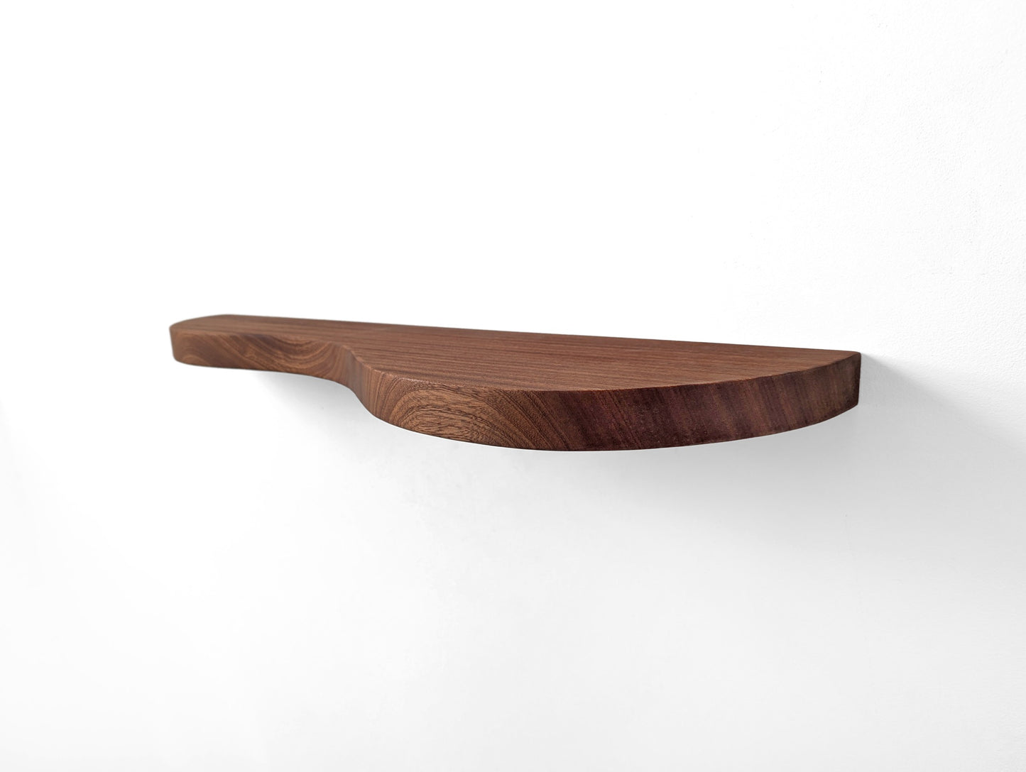A mahogany double curved floating shelf, photo taken from right upper angle