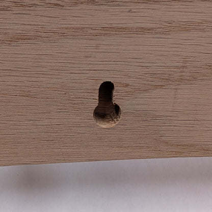 Keyhole slot attachment