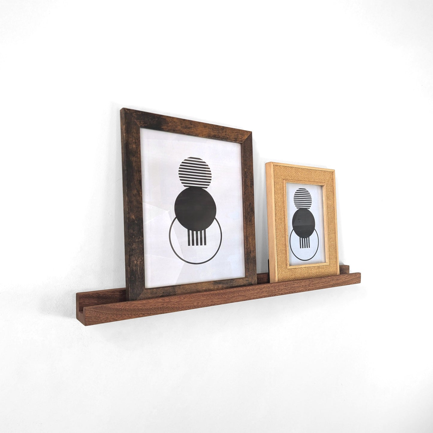 Angled view of a mahogany ledge display.